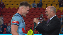Angus Crichton receives the Wally Lewis Medal. 