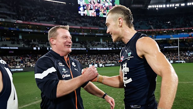MELBOURNE, AUSTRALIA - JULY 28: Patrick Cripps of the Blues celebrates with Michael Voss, Senior Coach of the Blues during the 2023 AFL Round 20 match between the Collingwood Magpies and the Carlton Blues at The Melbourne Cricket Ground on July 28, 2023 in Melbourne, Australia. (Photo by Dylan Burns/AFL Photos via Getty Images)