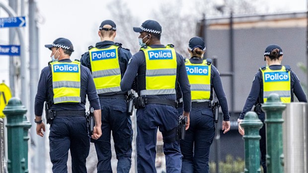 Police patrol Melbourne CBD during lockdown.