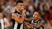 Nick Daicos of the Magpies celebrates a goal against Essendon.