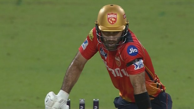Glenn Maxwell reacts after he was bowled by Kolkata Knight Riders' Varun Chakravarthy.