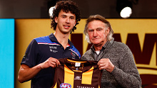 MELBOURNE, AUSTRALIA - NOVEMBER 20: William McCabe is seen with Michael Tuck after being selected at number 19 by Hawthorn during the 2023 AFL Draft at Marvel Stadium on November 20, 2023 in Melbourne, Australia. (Photo by Michael Willson/AFL Photos via Getty Images)