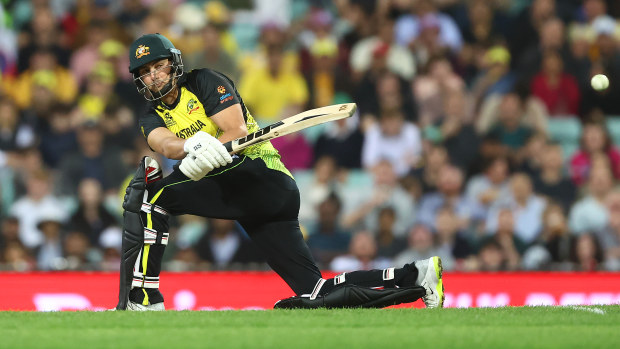 SYDNEY, AUSTRALIA - OCTOBER 22: Tim David of Australia bats during the ICC Men's T20 World Cup match between Australia and New Zealand at Sydney Cricket Ground on October 22, 2022 in Sydney, Australia. (Photo by Mark Metcalfe-ICC/ICC via Getty Images,)