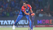 Mitchell Starc of Delhi Capitals runs out to Yashasvi Jaiswal of Rajasthan Royals.
