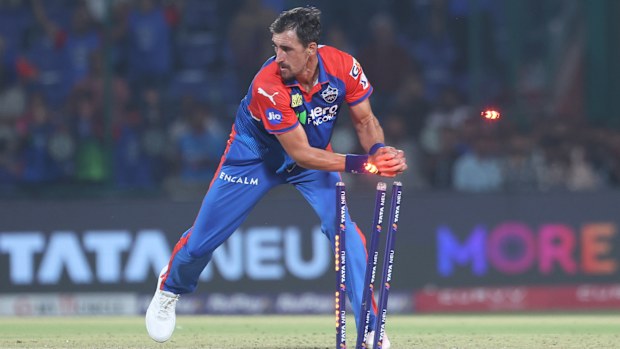 Mitchell Starc of Delhi Capitals runs out to Yashasvi Jaiswal of Rajasthan Royals.