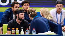 Nikoloz Basilashvili of Georgia speaks to the match doctor.