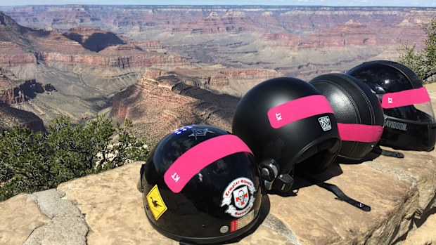Riders pay tribute to their friend Babs with pink ribbons. (Simon Bouda)