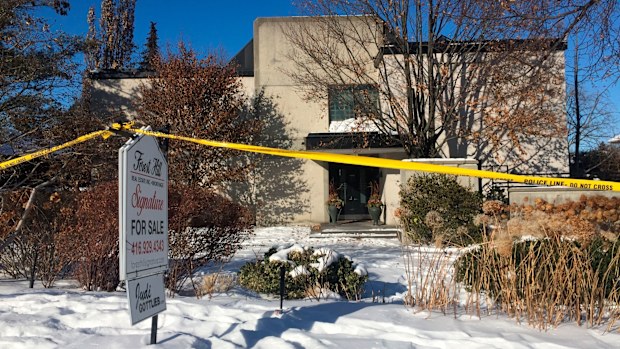 In this 2018 photo, police crime scene tape marks off the property belonging to Barry and Honey Sherman, who were found strangled inside their home.