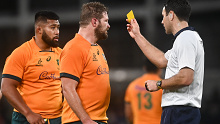 Folau Fainga'a (left) is shown a yellow card by referee Ben O'Keeffe after repeated infringements.
