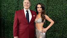 Former NFL coach Bill Belichick and girlfriend Jordon Hudson pose for a photo.