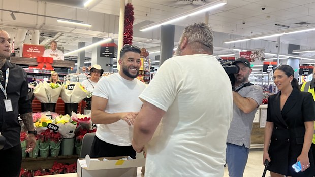 Australians have been lining up all morning to get a slice of billionaire Adrian Portelli's $150,000 giveaway, with the lucky ones planning to use the money to alleviate cost of living pressures.