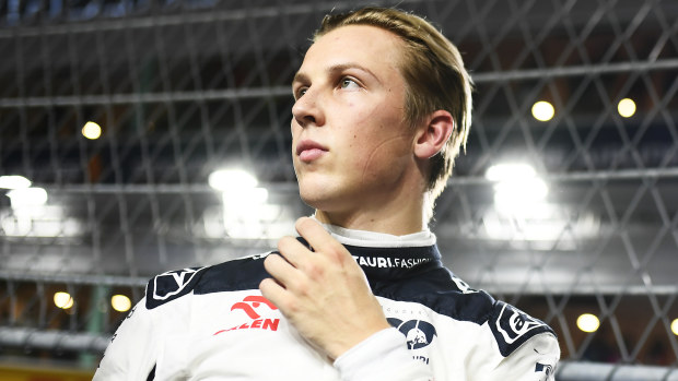 Liam Lawson of New Zealand and Scuderia AlphaTauri prepares to drive on the grid during the F1 Grand Prix of Singapore at Marina Bay Street Circuit on September 17, 2023 in Singapore, Singapore. (Photo by Rudy Carezzevoli/Getty Images)