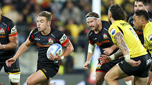 Cortez Ratima of the Chiefs on attack during the Super Rugby Pacific semi-final match.