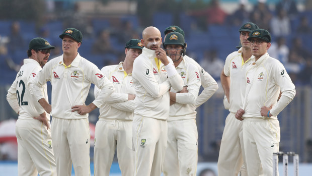 Australian players wait for a DRS review during day one of the Second Test match in the series between India and Australia at Arun Jaitley Stadium on February 17, 2023 in Delhi, India. (Photo by Pankaj Nangia/Getty Images)