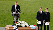 Adam Selwood speaks at his twin brother Troy's funeral in February.