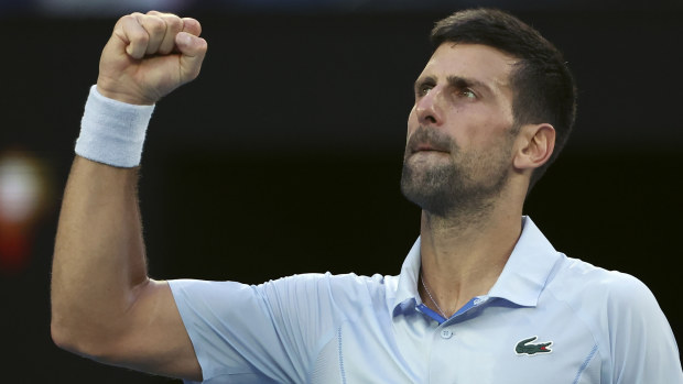 Novak Djokovic celebrates after defeating Taylor Fritz at the Australian Open.