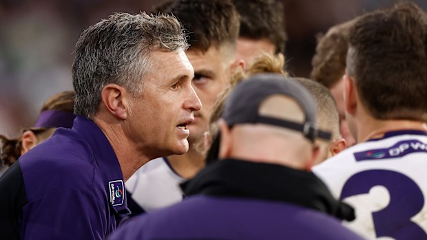 Justin Longmuir, Senior Coach of the Dockers addresses his players during the 2025 AFL Round 19 match between the Collingwood Magpies and the Fremantle Dockers at the Melbourne Cricket Ground on July 20, 2025 in Melbourne, Australia. (Photo by Michael Willson/AFL Photos via Getty Images)