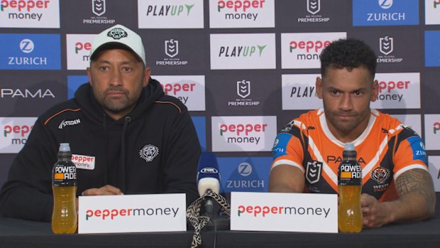 Benji Marshall and Sunia Turuva react after the Wests Tigers loss to the Melbourne Storm.