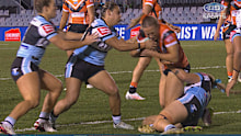 Jaydika Tafua falls on the ankle of Claudia Nielsen. 
