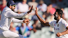 Virat Kohli and Ravichandran Ashwin of India celebrate.