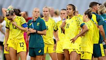 Players from Team Australia (Matildas) show dejection after losing to Germany.