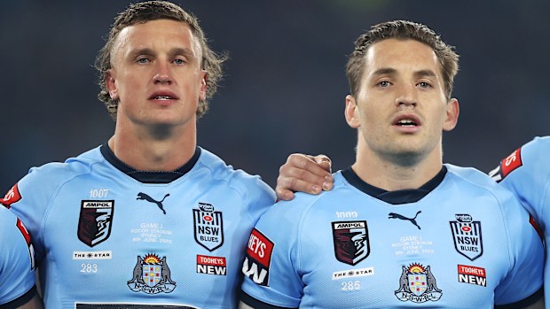 NSW players Jack Wighton, Cameron Murray and Ryan Matterson stand for the national anthem before game one of the 2022 State of Origin series.