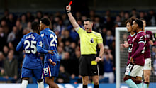 LONDON, ENGLAND - FEBRUARY 21: Wesley Fofana of Chelsea is shown a red card by match referee Lewis Smith during the Premier League match between Chelsea and Burnley at Stamford Bridge on February 21, 2026 in London, England. (Photo by Jasper Wax/Getty Images)