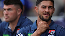 Dylan Brown of the Knights sits alongside Bradman Best on the bench.