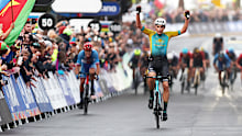 Yevgeniy Fedorov of Kazahkstan celebrates winning ahead of Mathias Vacek of Czech Republic during the 95th UCI Road World Championships 2022 - Men U23 Road Race.