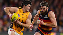 Tom Barrass of the Hawks and Riley Thilthorpe of the Crows during the AFL First Semi Final match between the Adelaide Crows and the Hawthorn Hawks at Adelaide Oval on September 12, 2025 in Adelaide, Australia. (Photo by Sarah Reed/AFL Photos via Getty Images)