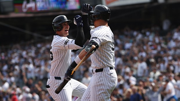 Cody Bellinger #35 and Aaron Judge #99 of the New York Yankees celebrate a home run during the game against the Milwaukee Brewers at Yankee Stadium on March 29, 2025 in New York, New York. (Photo by New York Yankees/Getty Images)