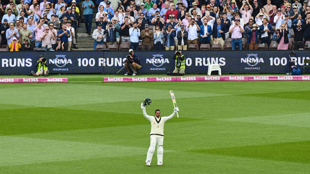 Usman Khawaja of Australia celebrates after scoring a century during day two of the Second Test match in the series between Australia and South Africa at Sydney Cricket Ground on January 05, 2023 in Sydney, Australia. (Photo by Brett Hemmings - CA/Cricket Australia via Getty Images)