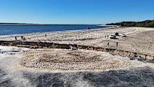 A sinkhole has opened up at Inskip Point north of Rainbow Beach in Queensland. 