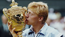 Boris Becker of Germany kisses the Gentleman's trophy to celebrate his victory over Kevin Curren 6-3, 6-7 (4-7), 7-6 (7-3), 6-4 during the Men's Singles final of the Wimbledon Lawn Tennis Championship on 7 July 1985 at the All England Lawn Tennis and Croquet Club in Wimbledon in London, England. It was Becker's 1st career Grand Slam title and his 1st Wimbledon title. (Photo by Steve Powell/Allsport/Getty Images)