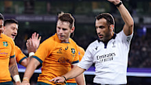 Referee Mathieu Raynal and Australia's Bernard Foley.