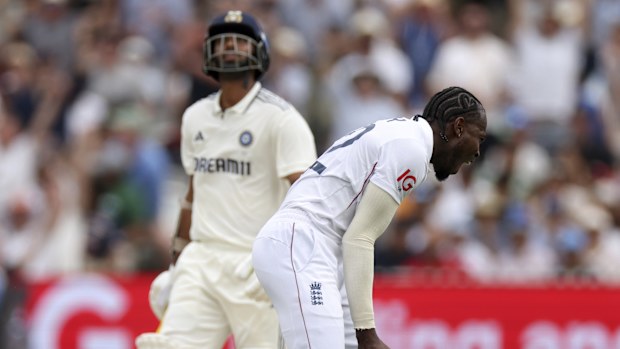England's Jofra Archer, right, celebrates the dismissal of India's Washington Sundar.