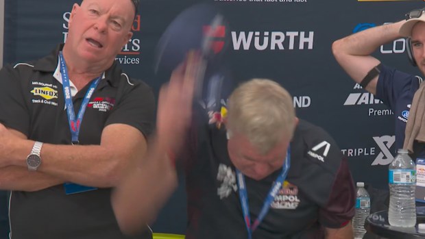 Paul Feeney throws his hat to the ground in disgust after his son Broc Feeney was involved in a big crash on Sunday at the Australian Grand Prix.