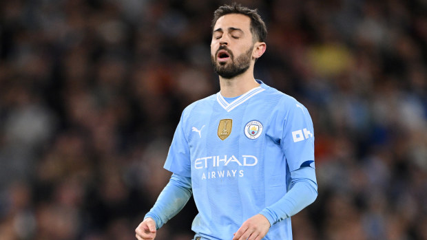 Bernardo Silva of Manchester City reacts after missing his penalty.