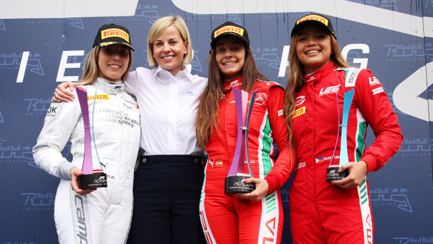 (From left) second placed Nerea Marti, Susie Wolff, the managing director of F1 Academy, race winner Marta Garciam and third placed Bianca Bustamante.