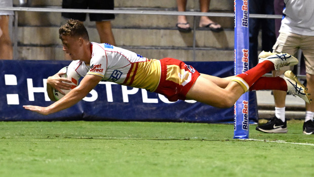 Jack Bostock of the Dolphins scores a try during the NRL Trial Match between the Dolphins and the Gold Coast Titans at Kayo Stadium on February 19, 2023 in Brisbane, Australia. (Photo by Bradley Kanaris/Getty Images)