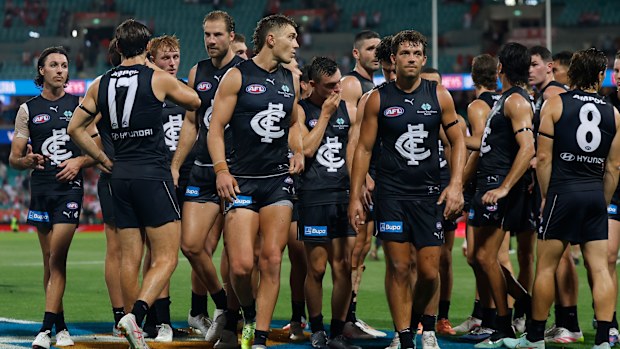 Patrick Cripps leads Carlton off the field.