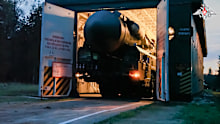 In this photo released by Russian Defense Ministry Press Service last Monday, a Yars intercontinental ballistic missile launcher rolls from an hangar during a military exercise near Yoshkar-Ola, Russia. 