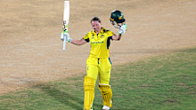 Alyssa Healy of Australia celebrates her century during the ICC Women's Cricket World Cup India 2025 match between India and Australia.