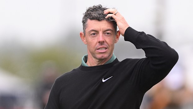 Rory McIlroy of Northern Ireland reacts on the 18th green on day one of The 152nd Open championship at Royal Troon on July 18, 2024 in Troon, Scotland. (Photo by Ross Kinnaird/Getty Images)
