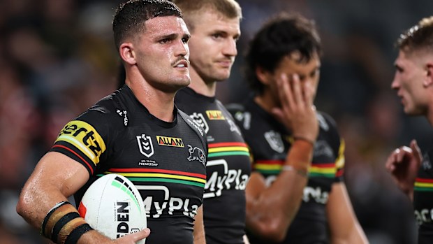 Nathan Clery of the Panthers and Team Mates Look on after Loss. 
