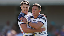 MELBOURNE, AUSTRALIA - FEBRUARY 23: Tom Duffy and Scott Drinkwater of the Cowboys celebrate scoring a try during the 2025 NRL Pre-Season Challenge match between Melbourne Storm and North Queensland Cowboys at Casey Fields on February 23, 2025 in Melbourne, Australia. (Photo by Morgan Hancock/Getty Images)