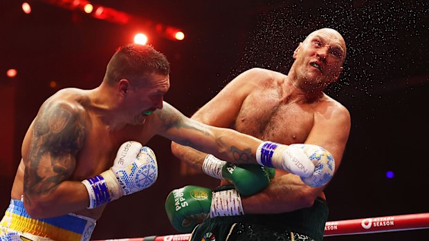 Oleksandr Usyk punches Tyson Fury during the IBF, WBA, WBC, WBO and Undisputed Heavyweight titles' fight between Tyson Fury and Oleksandr Usyk at Kingdom Arena on May 18, 2024 in Riyadh, Saudi Arabia. (Photo by Richard Pelham/Getty Images)