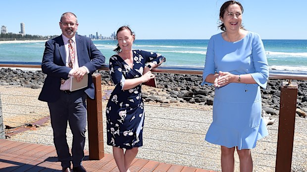 Dr Peter Aitken and Health Minister Yvette D'Ath and Premier Annastacia Palaszczuk pose for a photo in Burleigh Heads.