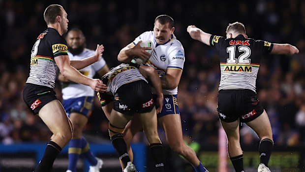 Reagan Campbell-Gillard is tackled during the NRL Qualifying Final match between the Penrith Panthers and the Parramatta Eels at BlueBet Stadium on September 09, 2022 in Penrith, Australia. (Photo by Matt King/Getty Images)