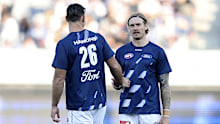 Tom Hawkins and Tom Stewart warm up in round 11, 2024.